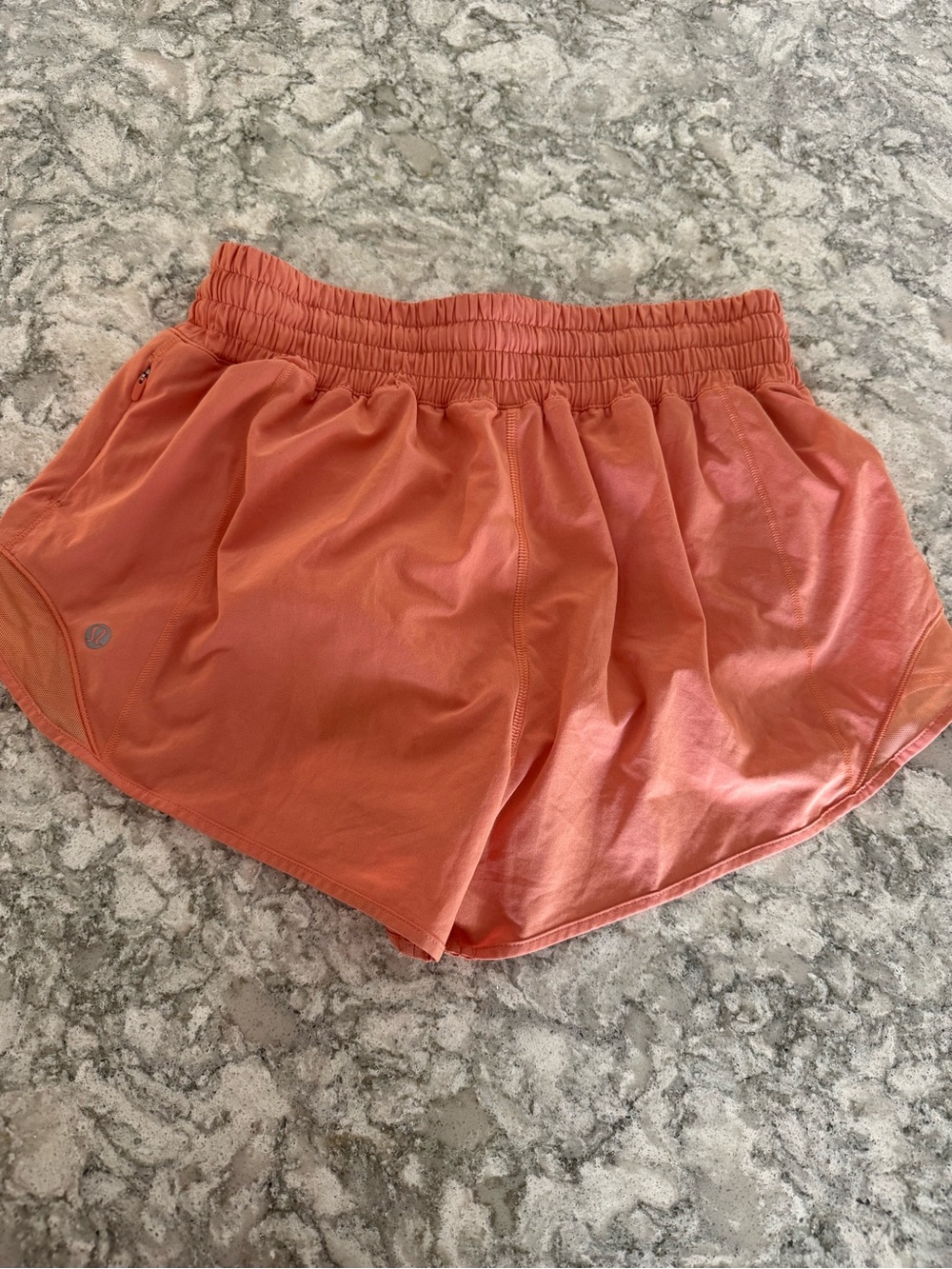 Lululemon Hotty Hot Shorts in a coral Sz 6